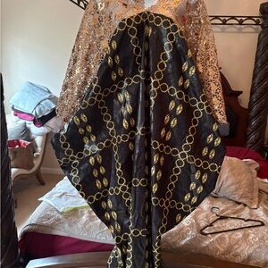 Elegant Nigerian Black and Gold Patterned Dress